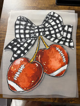 Load image into Gallery viewer, Football Cherry Bow MISSING ONE PIECE IN CORNER RTS DTF TRANSFER
